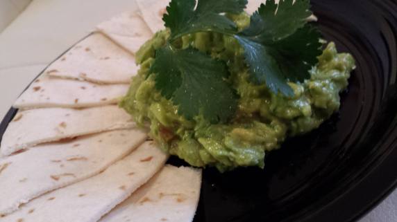 Guacamole served with quartered tortillas